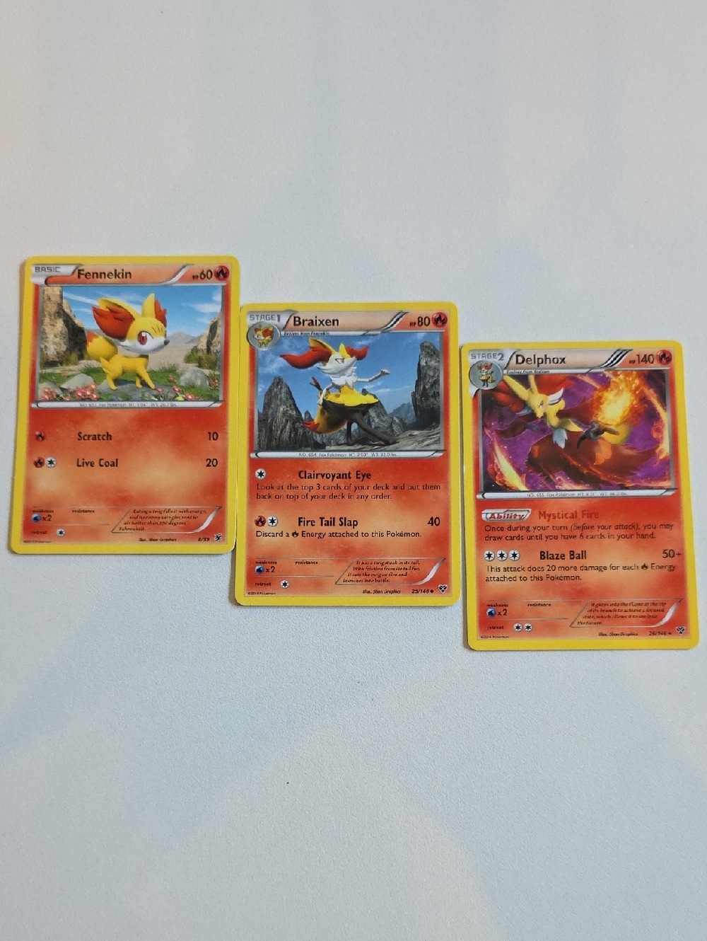 Pokemon Fennekin, Braixen, And Delphox Card